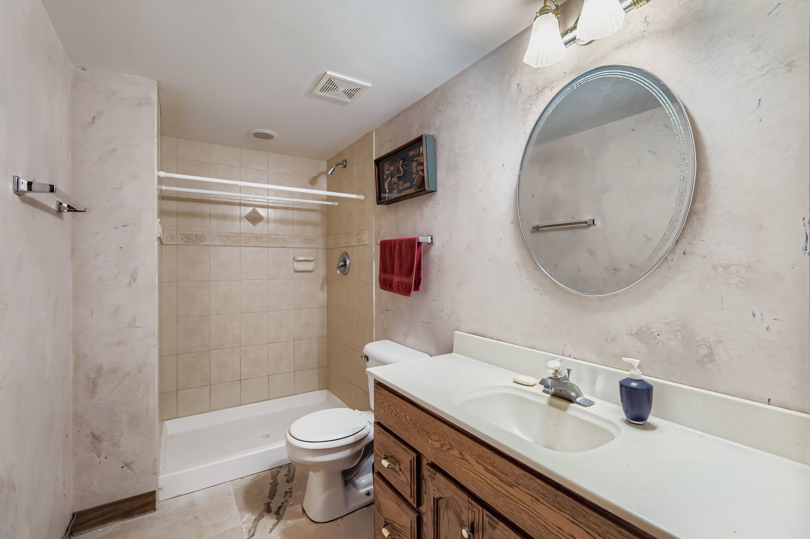 10785 Ashford Avenue Frankfort, IL 60423 - Photo 33 of 42 a bathroom with a sink a toilet and shower