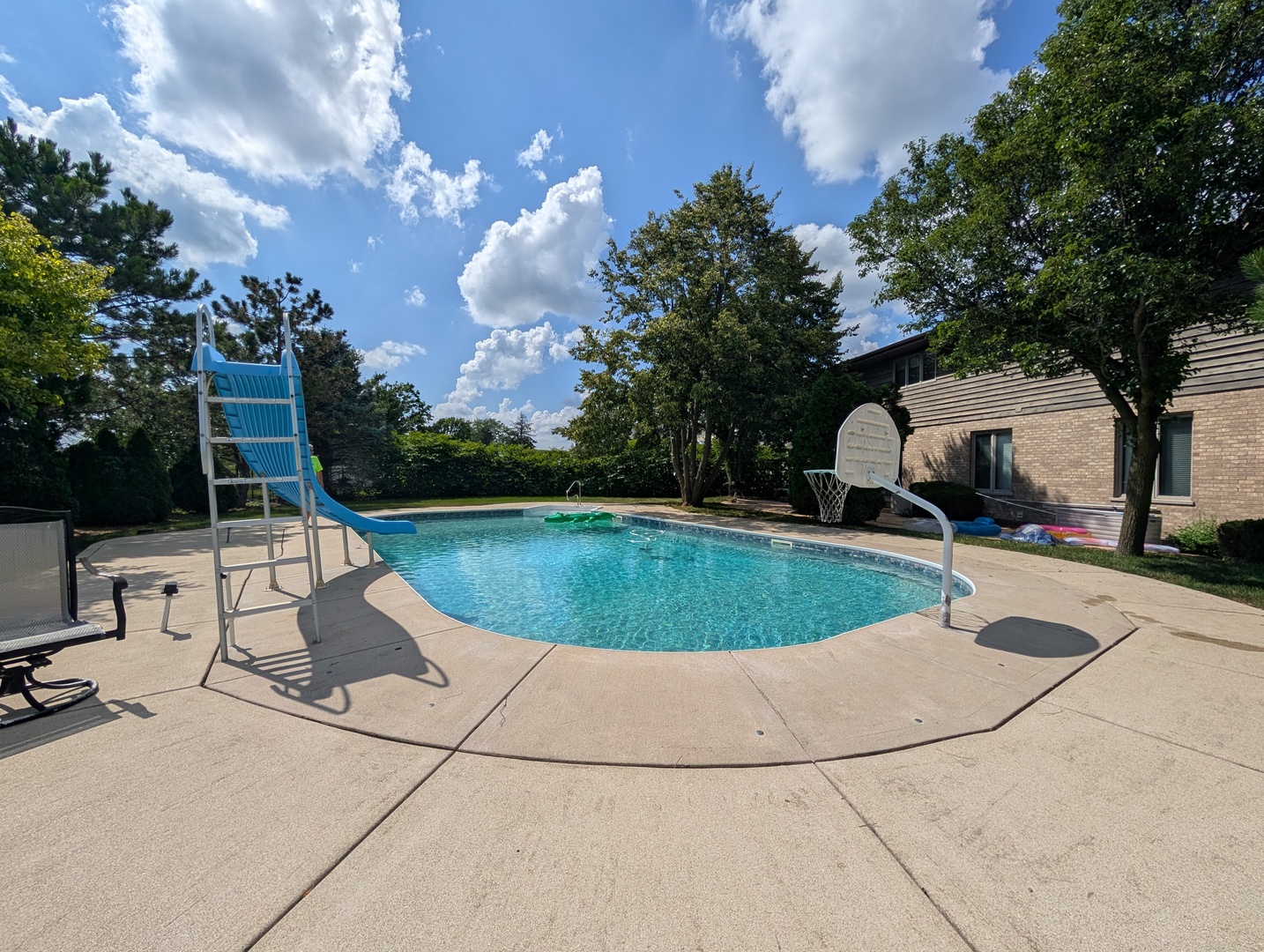 10785 Ashford Avenue Frankfort, IL 60423 - Photo 40 of 42 a view of a swimming pool with a patio