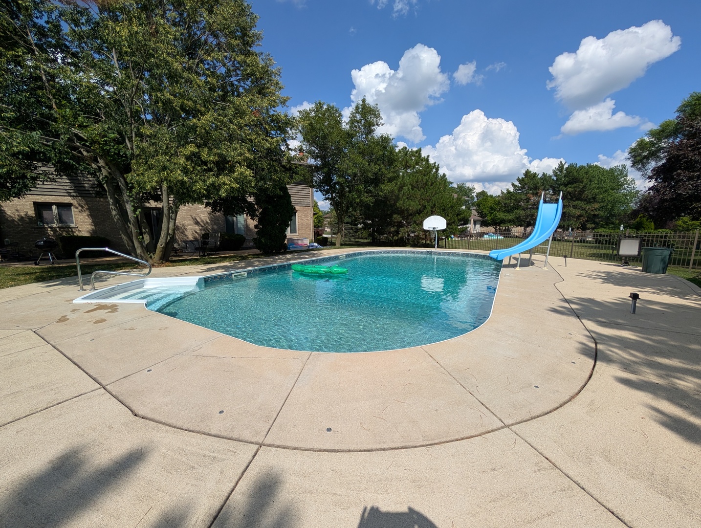 10785 Ashford Avenue Frankfort, IL 60423 - Photo 41 of 42 a view of a swimming pool with a yard