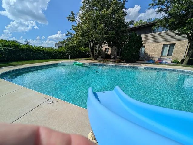 a view of a backyard with a garden