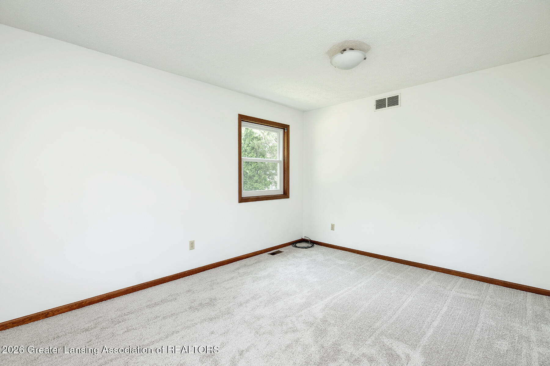 2620 Grovenburg Road Lansing, MI 48911 - Photo 4 of 39 04
