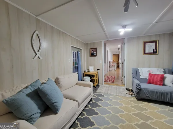 a living room with furniture and a couch