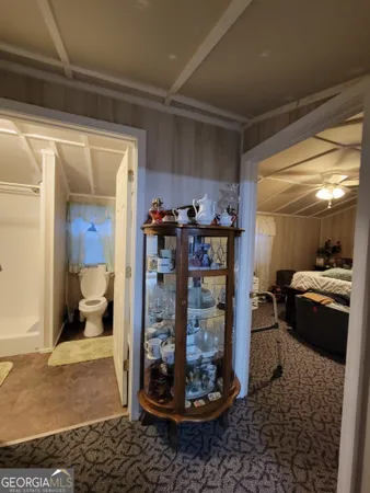 a view of a hallway with dining room