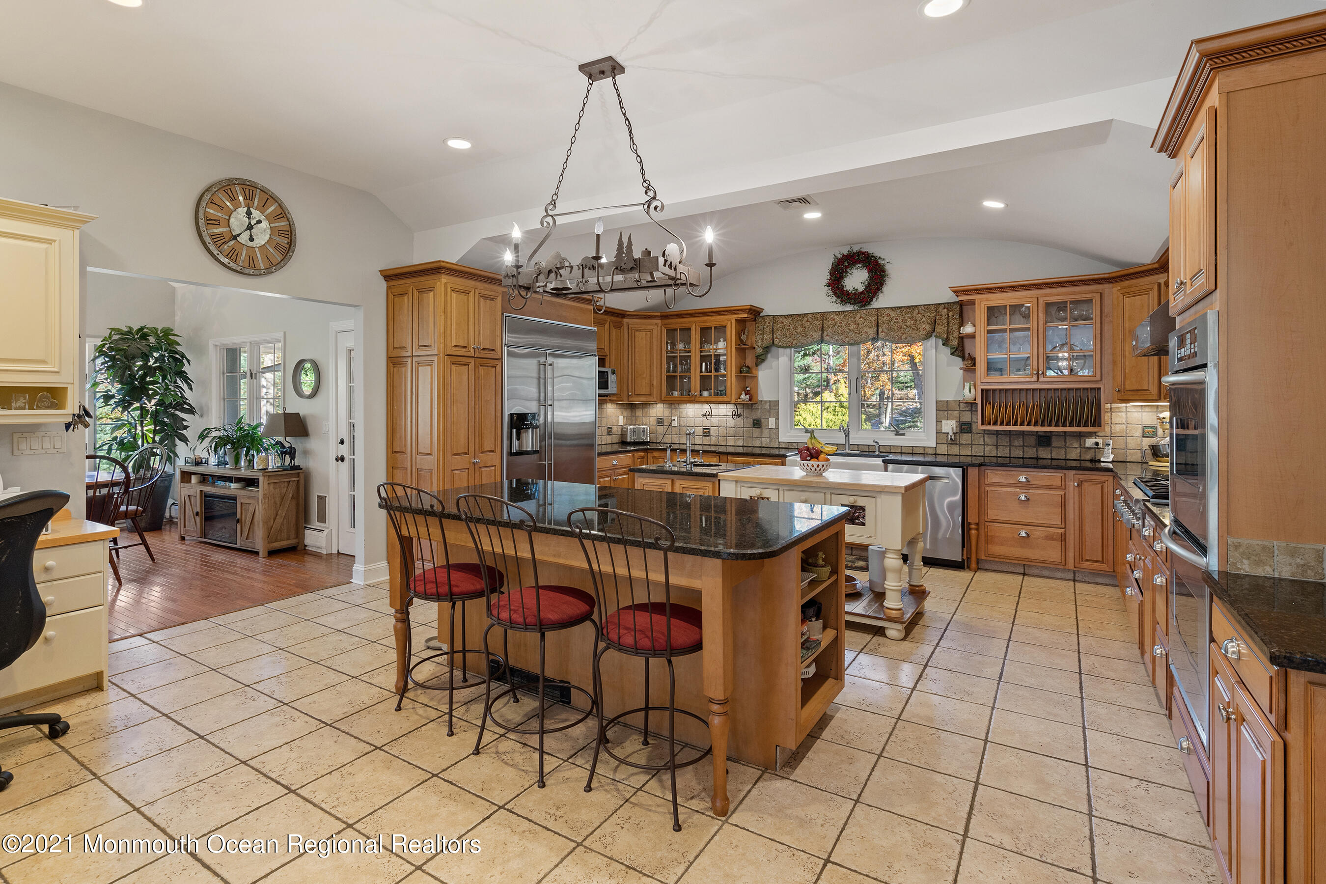 181 Mc Clees Road Red Bank, NJ 07701 - Photo 8 of 26 a kitchen with stainless steel appliances granite countertop a sink a stove top oven a counter space and cabinets