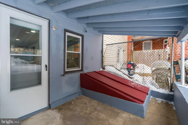 a bed room with a bed and balcony