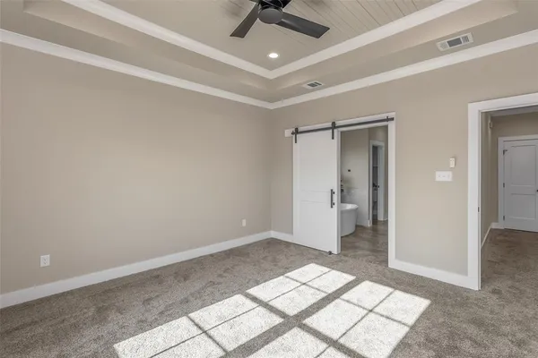 a white bath tub sitting in a bathroom