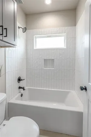 a kitchen with stainless steel appliances granite countertop a sink and cabinets with wooden floor