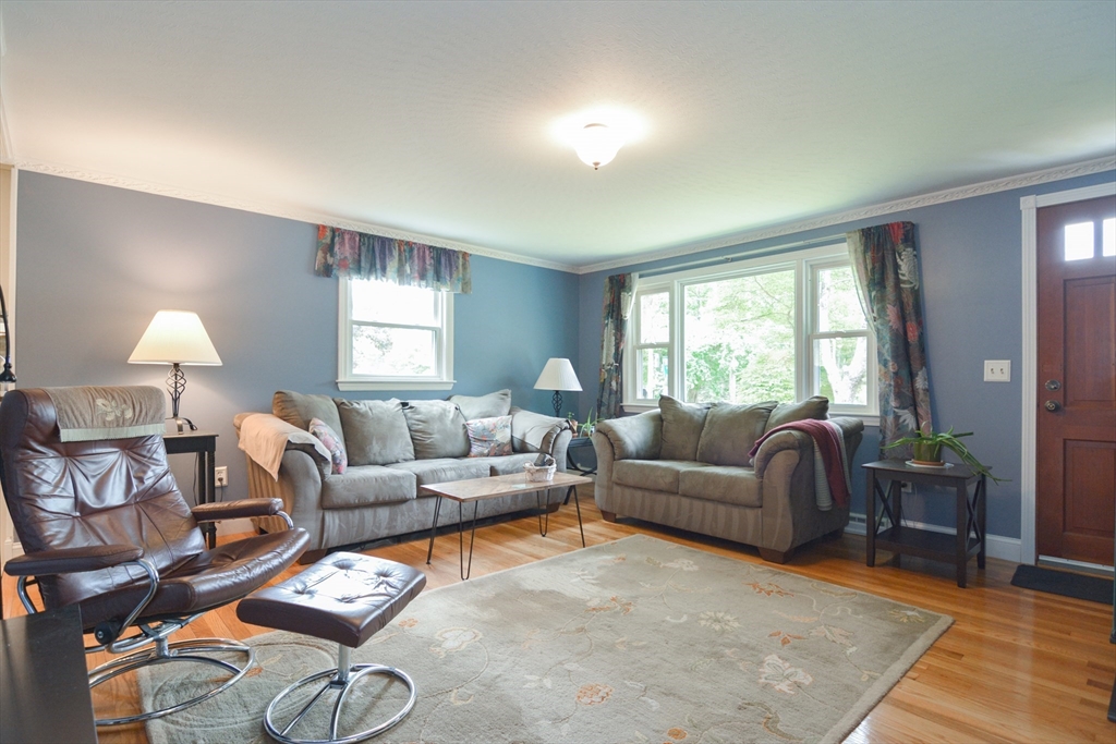 48 Smiths Lane Kingston, MA 02364 - Photo 12 of 38 a living room with furniture and a large window