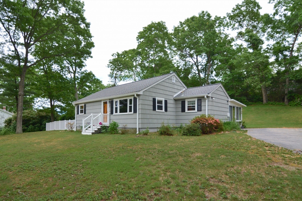 48 Smiths Lane Kingston, MA 02364 - Photo 2 of 38 a front view of a house with garden