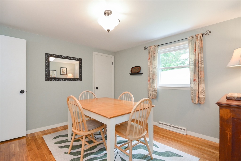 48 Smiths Lane Kingston, MA 02364 - Photo 23 of 38 a view of a dining room with furniture and wooden floor