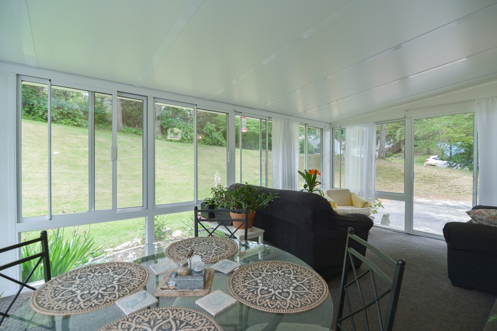 48 Smiths Lane Kingston, MA 02364 - Photo 25 of 38 a living room with furniture and a large window