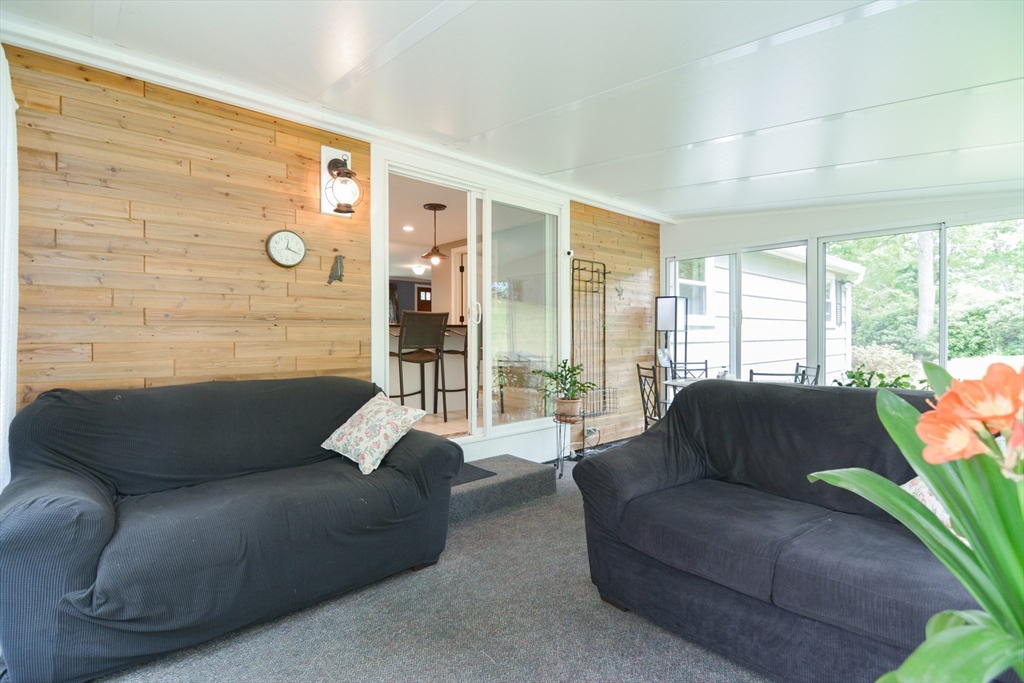 48 Smiths Lane Kingston, MA 02364 - Photo 27 of 38 a living room with furniture and a large window