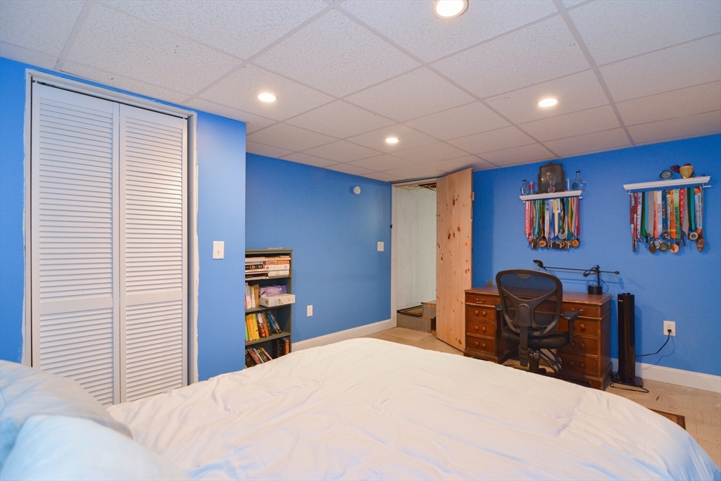 48 Smiths Lane Kingston, MA 02364 - Photo 29 of 38 a bedroom with a bed and furniture