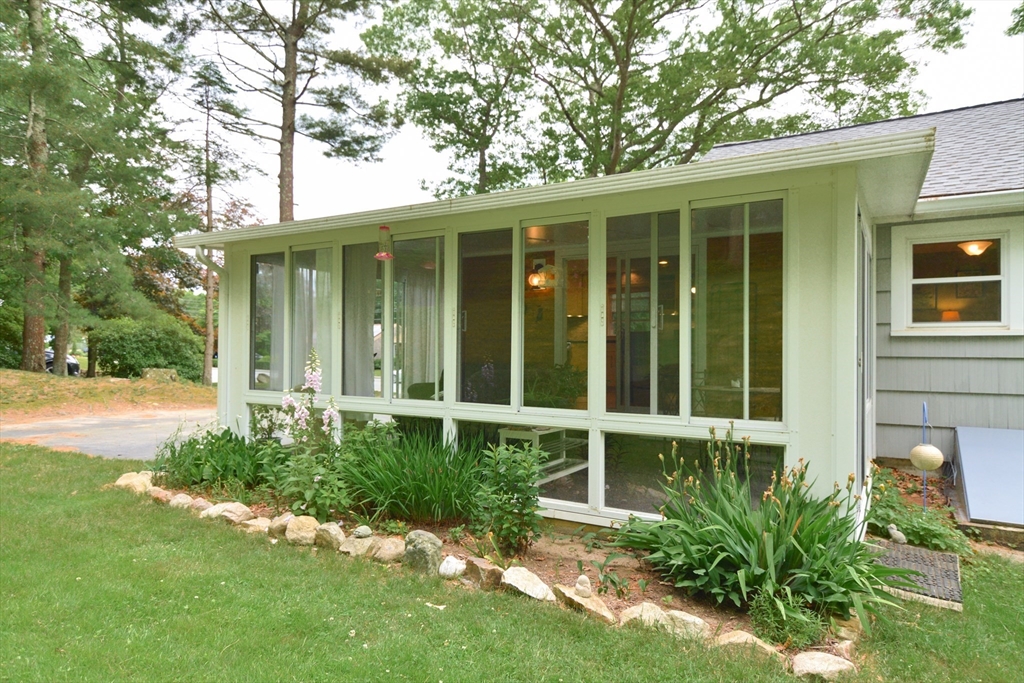 48 Smiths Lane Kingston, MA 02364 - Photo 4 of 38 a view of a house with a yard and plants