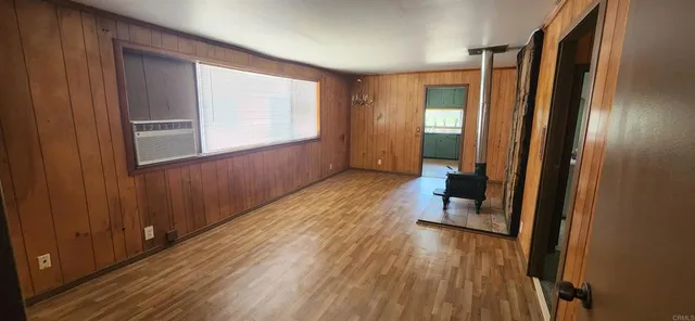 a view of empty room with windows