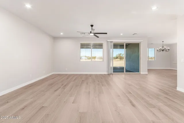 a spacious bathroom with a shower and a sink