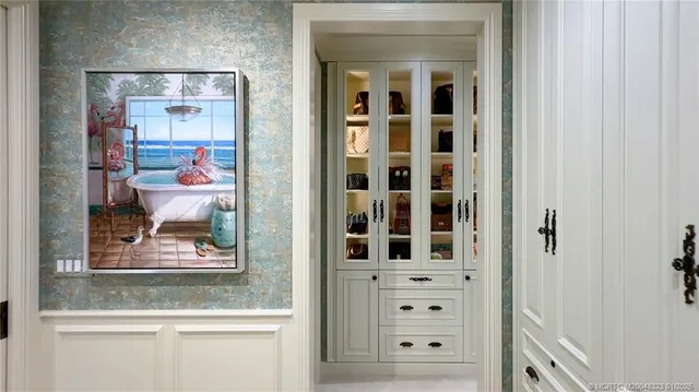 a front view of a house with a yard and a garage