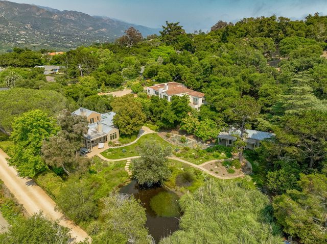 a view of a house with a garden
