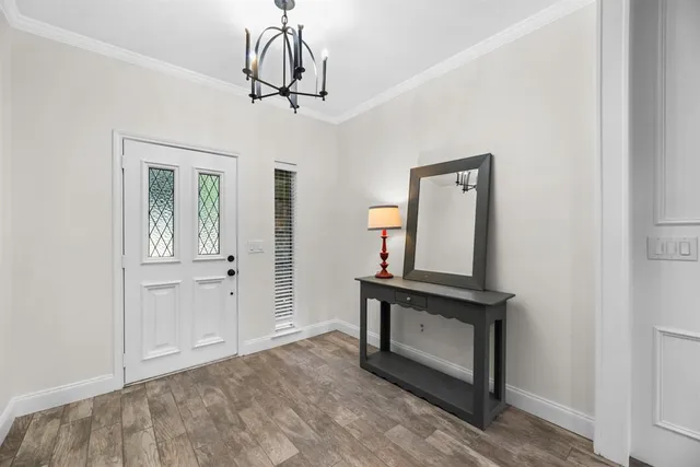 a view of entryway with wooden floor