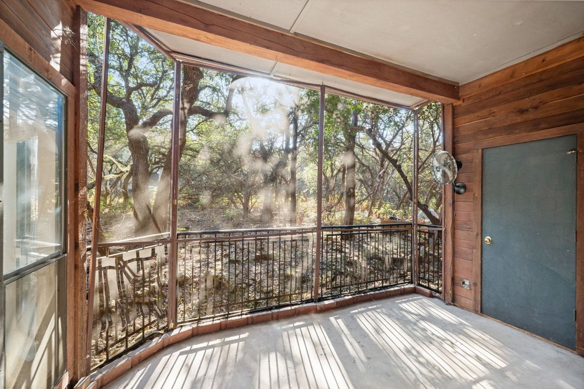 4711 Spicewood Springs Road, Unit 2107 Austin, TX 78759 - Photo 25 of 26 a view of a balcony with wooden floor