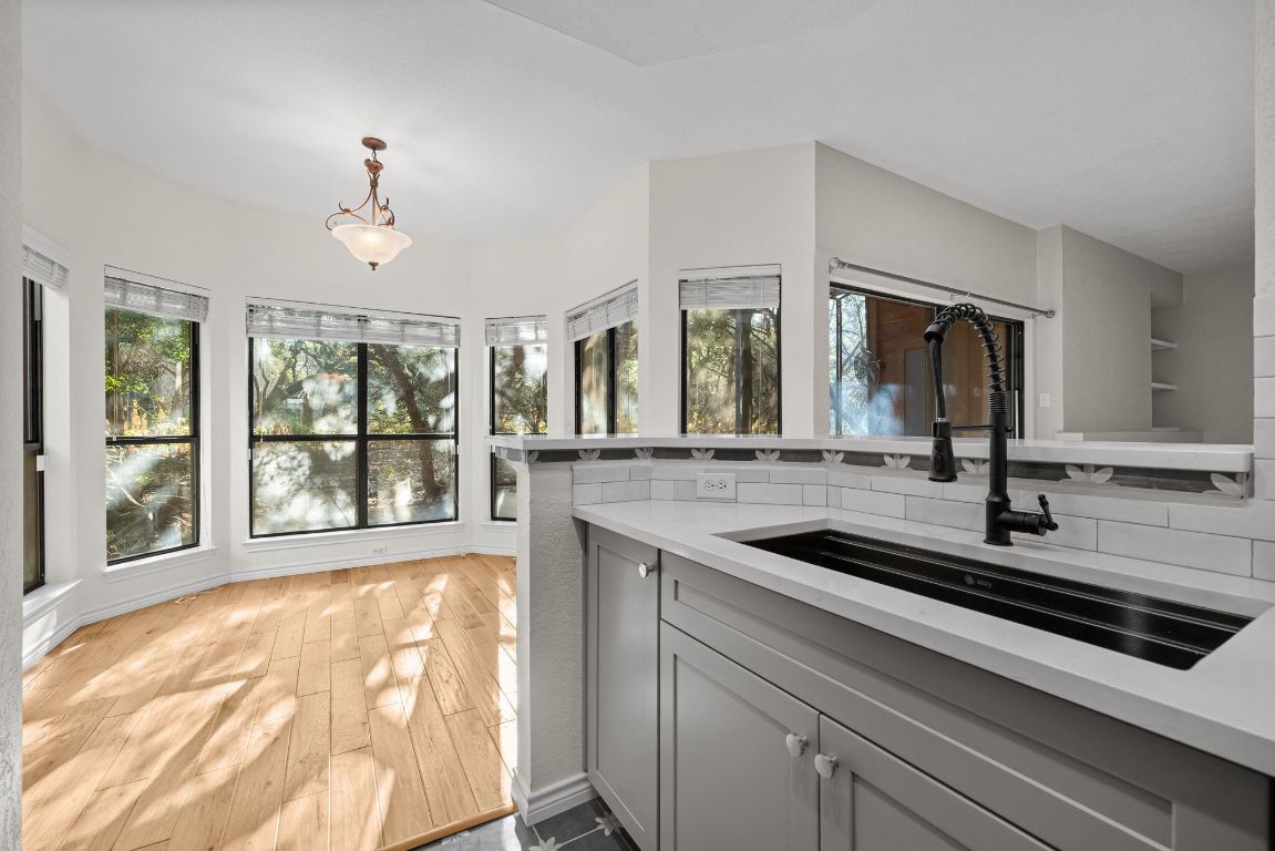 4711 Spicewood Springs Road, Unit 2107 Austin, TX 78759 - Photo 6 of 26 a view of a double sink and a large window in the room