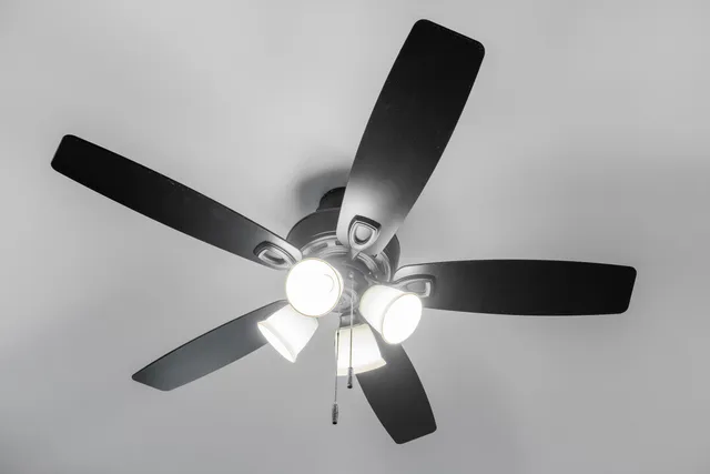 a living room with lots of furniture and kitchen view