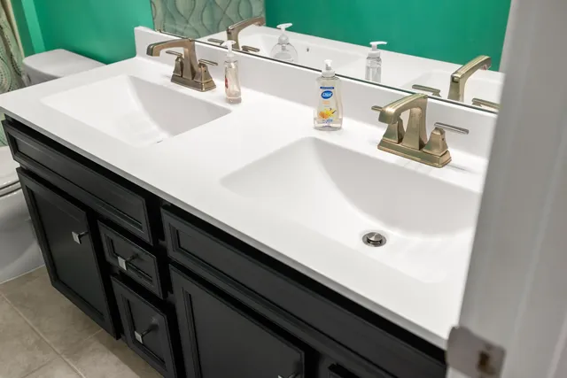 a bathroom with a sink and a toilet