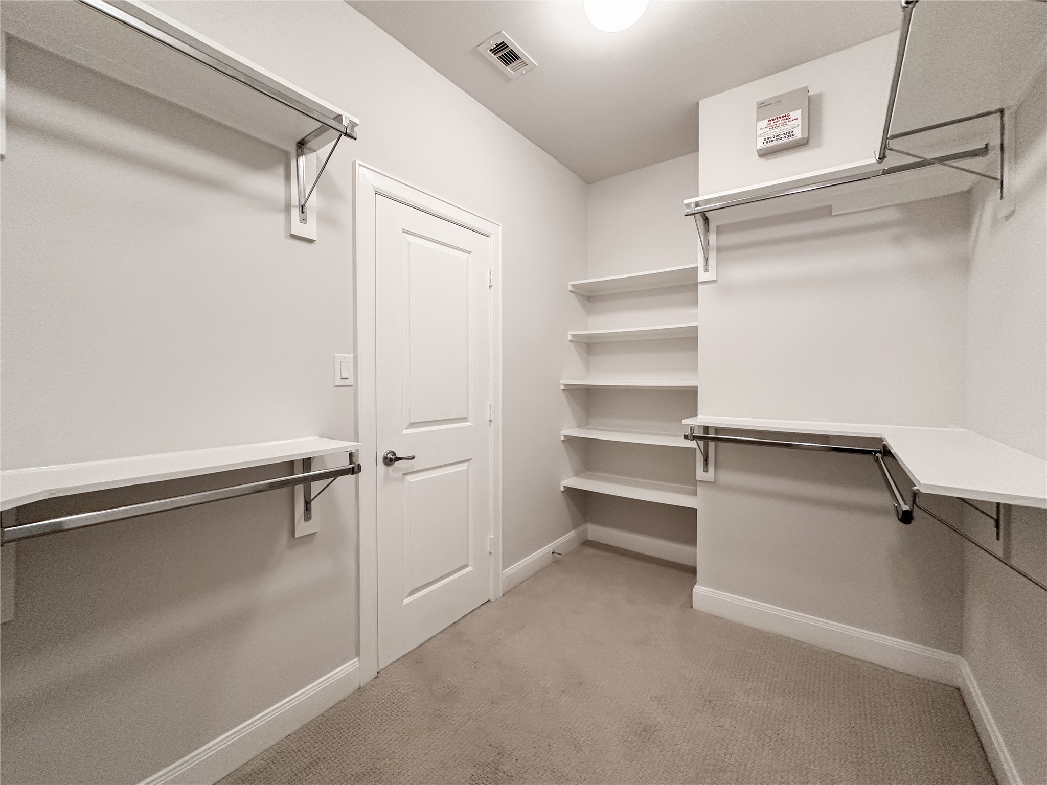 10 Hermann Park Court Houston, TX 77021 - Photo 22 of 32 a view of an empty walk in closet