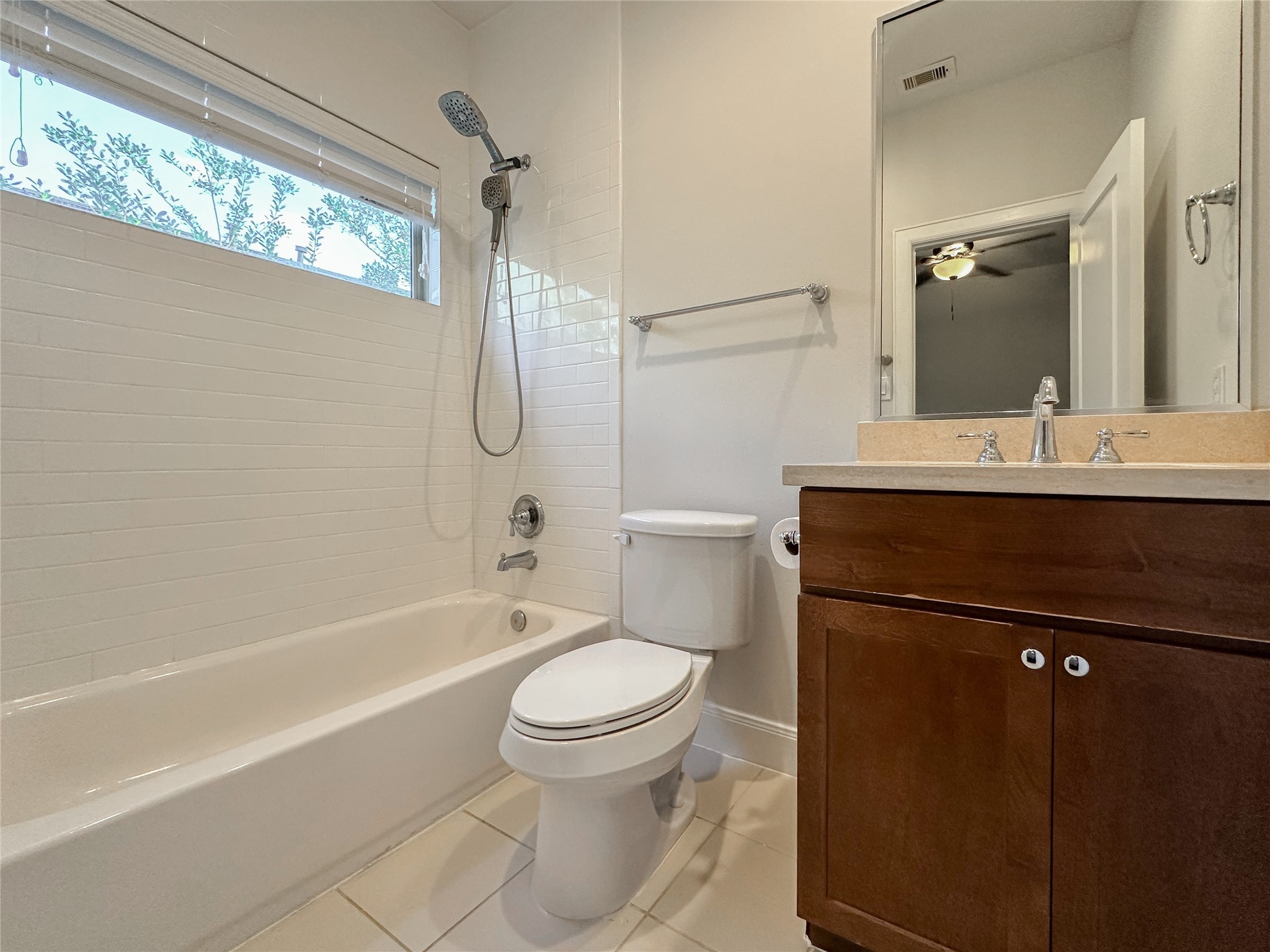10 Hermann Park Court Houston, TX 77021 - Photo 25 of 32 a bathroom with a sink a toilet and a bathtub