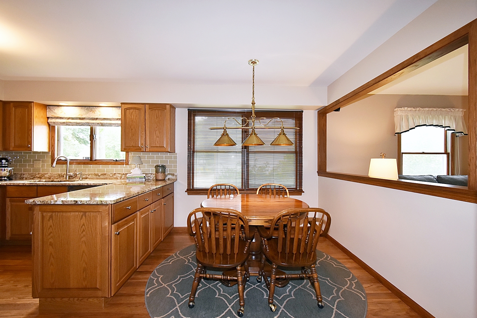 29 Manchester Way Aurora, IL 60506 - Photo 15 of 38 a view of a kitchen from a dining room