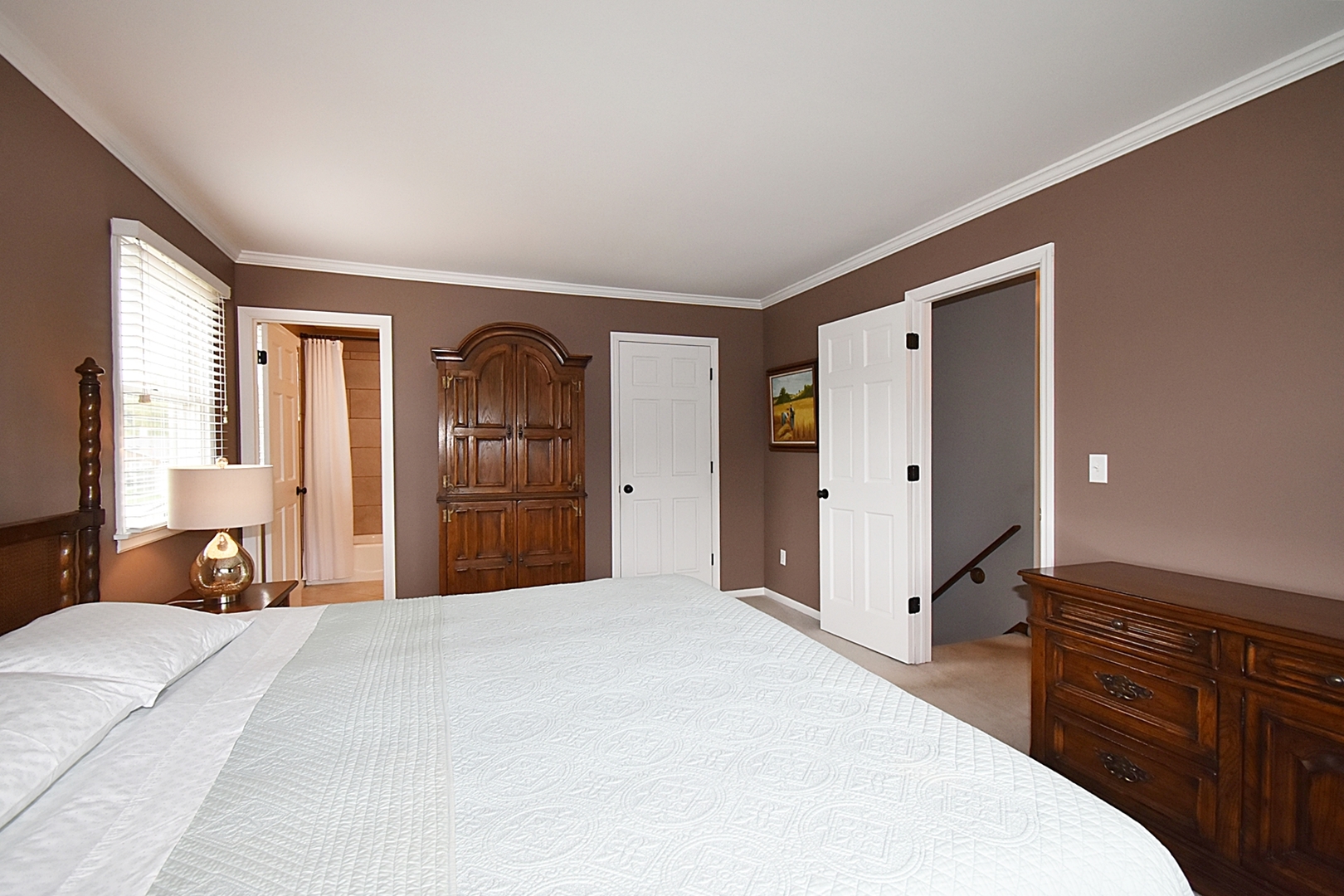 29 Manchester Way Aurora, IL 60506 - Photo 21 of 38 a bedroom with a bed and a dresser