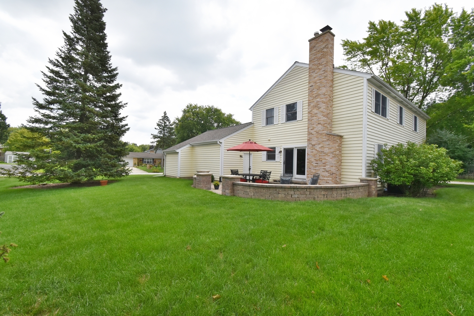 29 Manchester Way Aurora, IL 60506 - Photo 35 of 38 a front view of house with yard and green space
