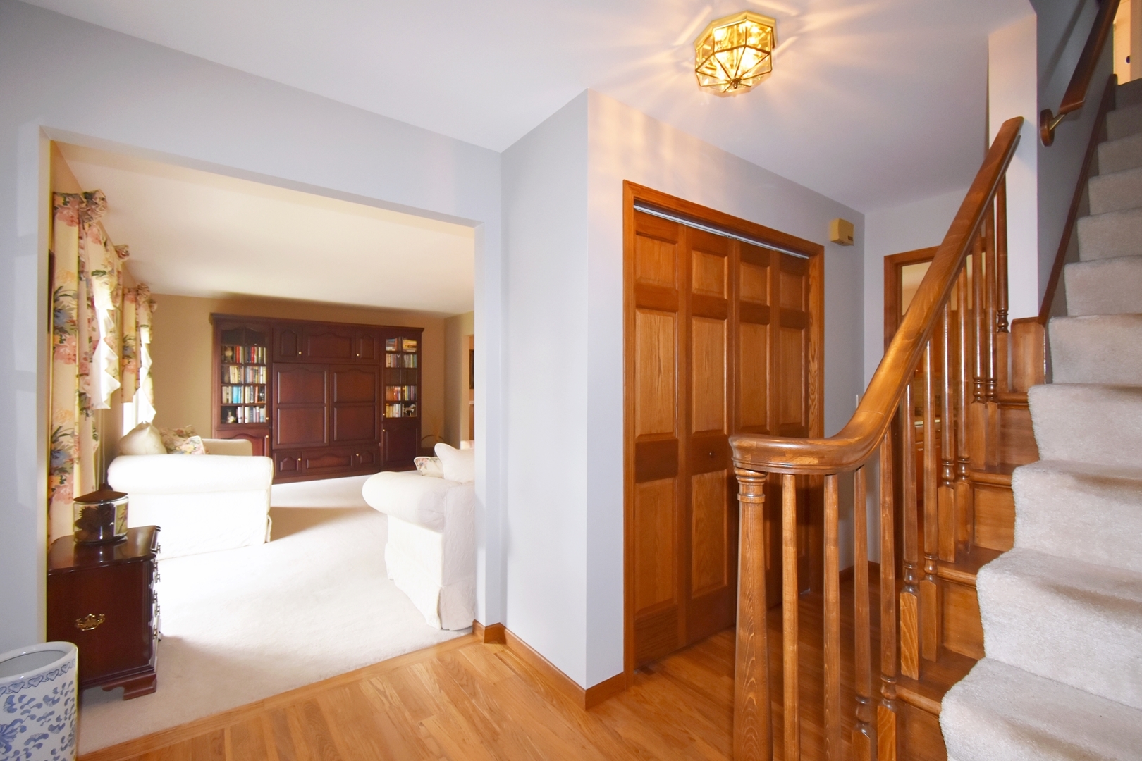 29 Manchester Way Aurora, IL 60506 - Photo 6 of 38 a view of an entryway with wooden floor and a bedroom