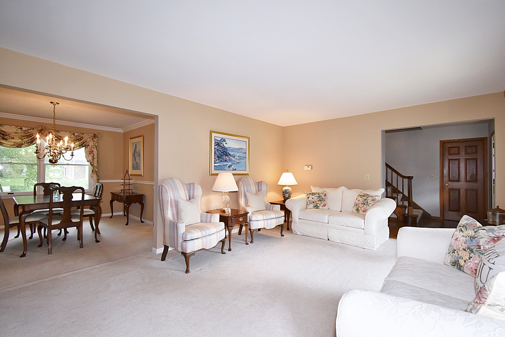 29 Manchester Way Aurora, IL 60506 - Photo 8 of 38 a living room with furniture and a large window