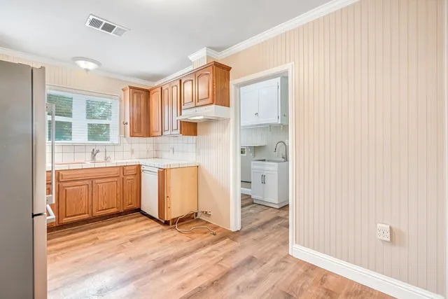 a view of a kitchen with a sink