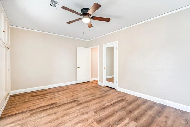 a view of a big room with carpet