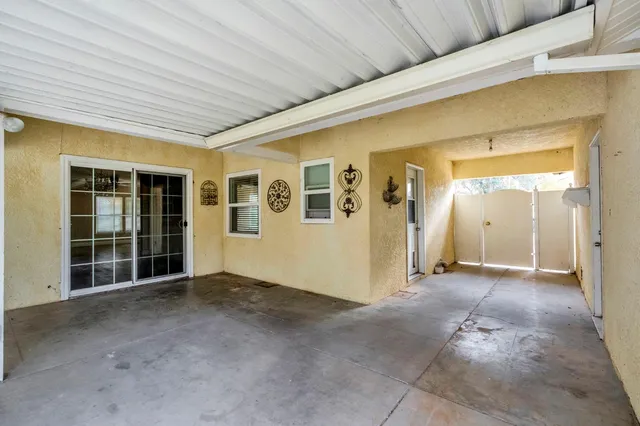 a view of empty room with windows