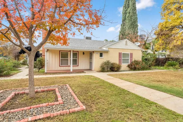front view of a house with a yard