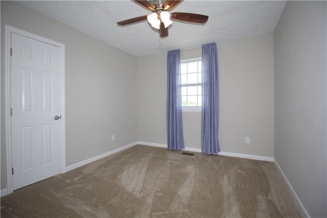7813 Bob Carr Road Cross Plains, TN 37049 - Photo 3 of 8 a view of a livingroom with a ceiling fan and window
