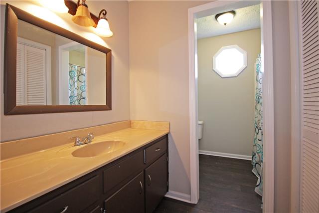 7813 Bob Carr Road Cross Plains, TN 37049 - Photo 6 of 8 a bathroom with a sink and a mirror