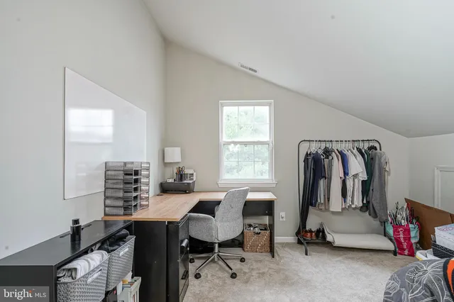 a view of balcony with wooden floor and fence