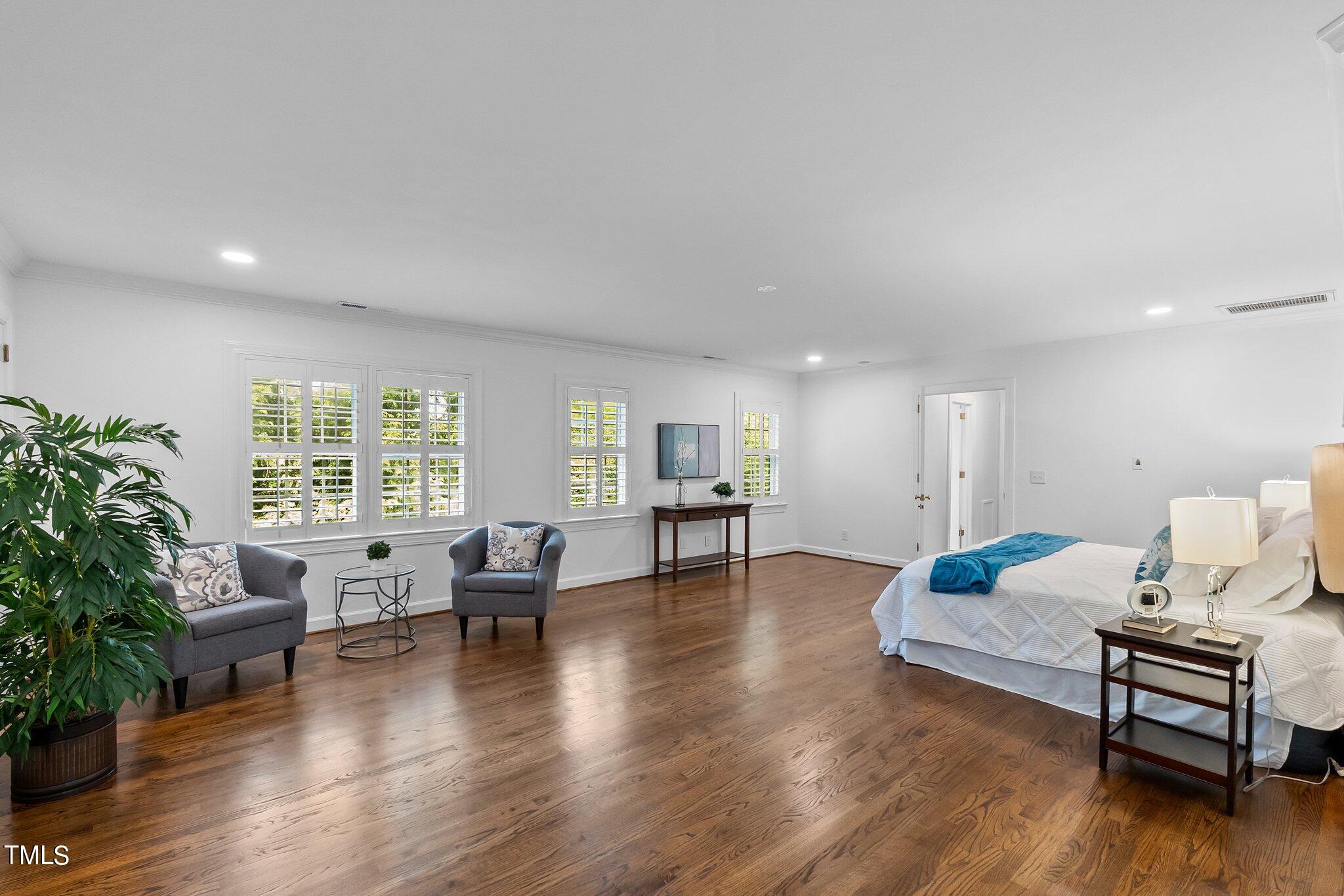 1817 Stillwater Drive Raleigh, NC 27607 - Photo 14 of 58 a living room with furniture and wooden floor