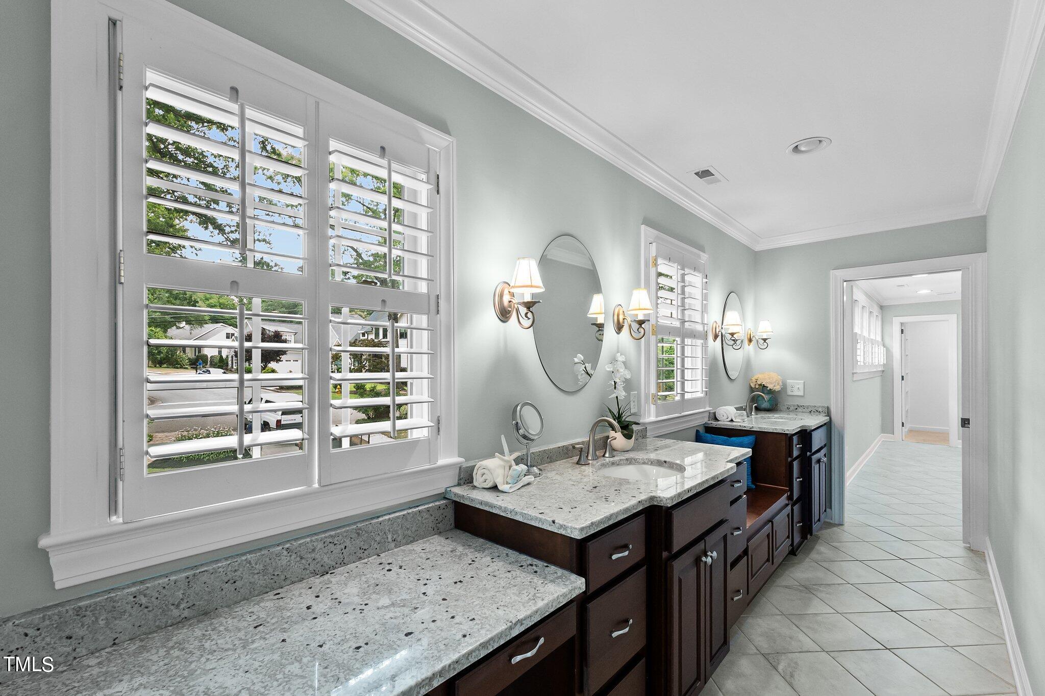 1817 Stillwater Drive Raleigh, NC 27607 - Photo 17 of 58 a view of a kitchen area with furniture and chandelier