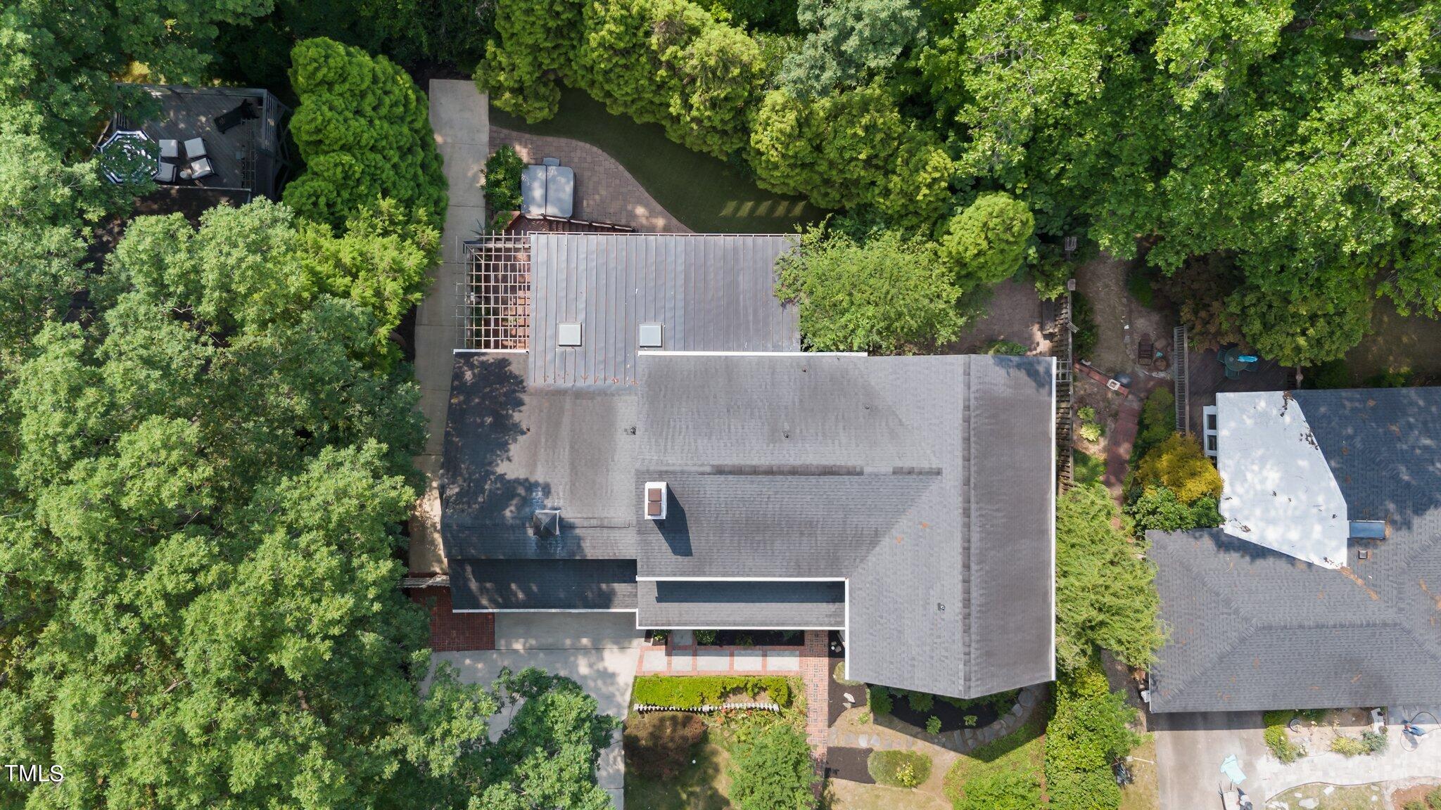 1817 Stillwater Drive Raleigh, NC 27607 - Photo 6 of 58 an aerial view of a house with a yard and potted plants