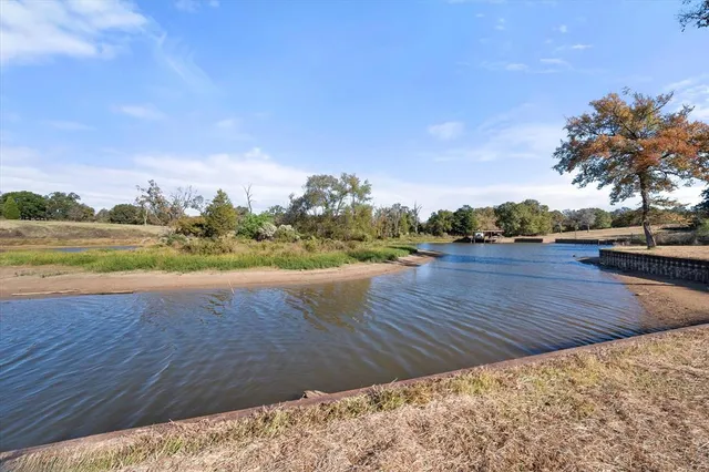 a view of outdoor space with yard and ocean view