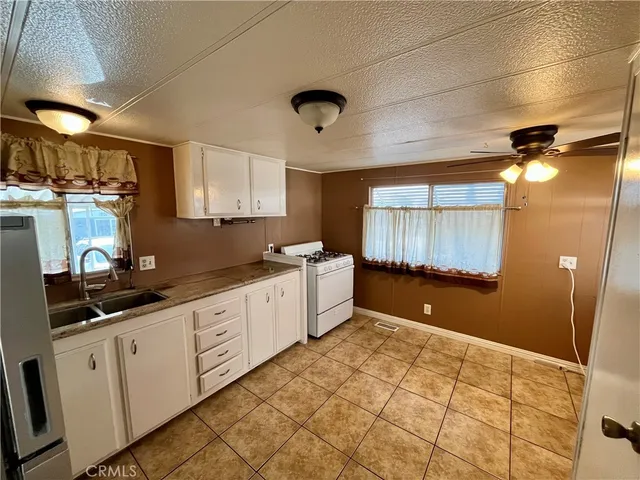 a bedroom with a bed and a view of bathroom