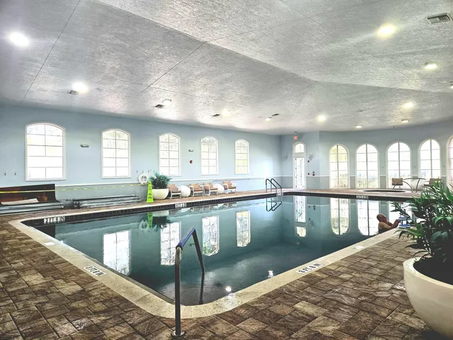 a large kitchen with a large window
