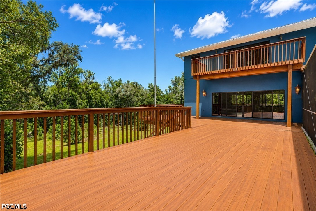 27255 Hickory Hill Road Brooksville, FL 34602 - Photo 41 of 50 a view of a house with a balcony