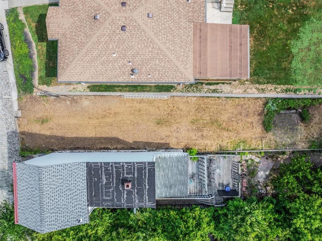520 Kendall Street Pittsburgh, PA 15201 - Photo 14 of 14 an aerial view of a house with a yard and a bench