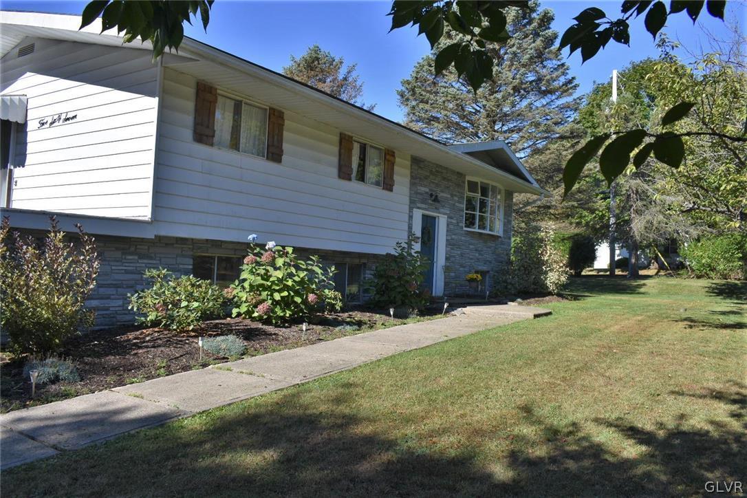 567 Cherry Hill Road Nazareth, PA 18064 - Photo 1 of 14 a front view of a house with a yard
